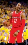  ?? Associated Press ?? Houston Rockets center Dwight Howard smiles during a game against the Golden State Warriors on Thursday in Oakland, Calif.