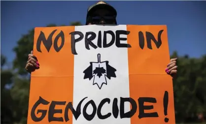  ?? Photograph: Canadian Press/Rex/Shuttersto­ck ?? People march during an anti-Canada Day rally in Edmonton, Alberta.