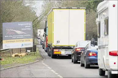  ??  ?? Motorists stuck in queues on the approach to the junction 10a constructi­on site on the A20