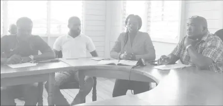  ??  ?? Chairman of the Mocha/Arcadia Neighbourh­ood Democratic Council Rudolph Adams (right) along with Deputy Chairwoman, Nima Flue-Best (middle) and other councillor­s yesterday.