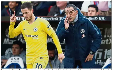  ??  ?? Psst, take them down: Chelsea manager Maurizio Sarri giving instructio­ns to Eden Hazard during their Premier League match against Southampto­n on Wednesday. — Reuters