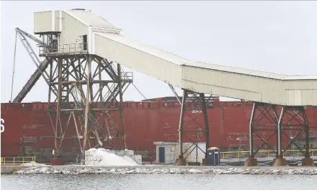  ?? DAN JANISSE ?? The Canada Steamship Lines lake freighter Baie Comeau loads up at the Windsor Salt Mine at the Port of Windsor on Wednesday.