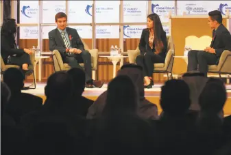  ?? Jon Gambrell / Associated Press ?? Moderator Vijita Patel (left) discusses the Parkland, Fla., school shooting with students Lewis Mizen, Suzanna Barna and Kevin Trejos in Dubai, United Arab Emirates.