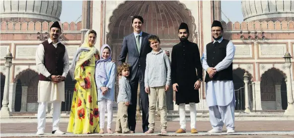  ?? — THE CANADIAN PRESS ?? Prime Minister Justin Trudeau, his wife Sophie Gregoire Trudeau, and children, Xavier, 10, Ella-Grace, 9, and Hadrien, 3, visit the Jama Masjid mosque in New Delhi, India, on Thursday.