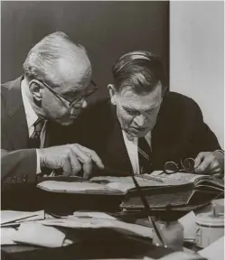  ?? ?? ABOVE: Yale University curator of maps Alexander Vietor and Thomas Marston examining the map at the Beinecke Rare Book & Manuscript Library in 1965.
