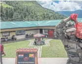  ??  ?? CARRYING WEIGHT: A military facility India uses as a regional headquarte­rs, in Haa, Bhutan.