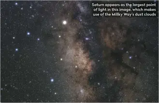  ??  ?? Saturn appears as the largest point of light in this image, which makes use of the Millky Way’s dust clouds