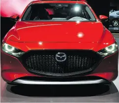  ?? DEREK MCNAUGHTON / DRIVING.CA ?? The 2019 Mazda3 “is one elegant-looking car.”