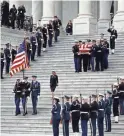  ?? POOL PHOTO BY ALEX BRANDON/AP ?? A military honor guard carries President George H.W. Bush’s casket from the U.S. Capitol on Wednesday.