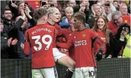  ?? Picture: CLIVE BRUNSKILL/GETTY IMAGES ?? SHINING MOMENT: Manchester United’s Alejandro Garnacho celebrates with Scott McTominay and Marcus Rashford after scoring their third goal against West Ham on Sunday