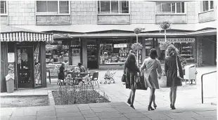  ??  ?? Shoppers walk through St John’s Square precinct in Perth in 1975.
