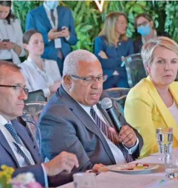  ?? Photo: Fijian Government ?? Prime Minister, Voreqe Bainimaram­a (middle) at the High-Level Panel for a Sustainabl­e Ocean Economy Leaders Lunch.