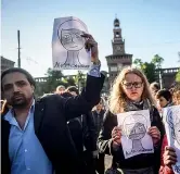  ??  ?? In piazza Manifestaz­ione a Milano per chiedere la liberazion­e del giornalist­a Gabriele Del Grande in carcere in Turchia (Foto LaPresse/Furlan)