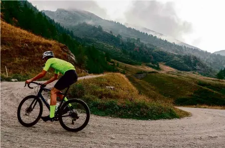  ??  ?? Left: This is one of the smoother hairpins on the gravel section. The road can be very rutted and you have to put a lot of effort into maintainin­g speed