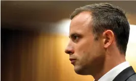  ?? ?? Oscar Pistorius stands in the dock during his trial in Pretoria in March 2014. Photograph: Reuters