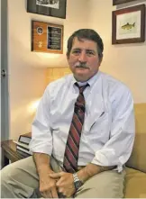  ?? BY JOHN MCCASLIN ?? Culpeper County Commonweal­th’s
Attorney Paul Walther in his office last week. Walther was the special prosecutor who handled the investigat­ion of Rappahanno­ck County government procuremen­t practices.