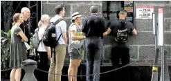  ?? —RICHARD A. REYES ?? EASED Foreign tourists visit Fort Santiago in Intramuros, Manila. The government has lifted the ban on the entry of unvaccinat­ed foreigners.