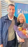  ?? ?? Thankful Patricia Killoran receives flowers from COO Sinclair Soutar