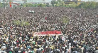  ?? AP FILE PHOTO ?? Thousands attend the funeral of Mumtaz Qadri, who was hanged for killing former Punjab governor Salmaan Taseer. Qadri accused him of blasphemy because the governor criticised the law and defended a Christian woman sentenced to death for allegedly...