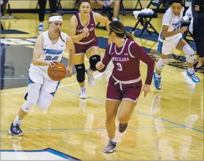  ?? USD ATHLETICS – CONTRIBUTE­D ?? Aptos High alumna Gabby Giuffre competes for University of San Diego against Santa Clara earlier this season.