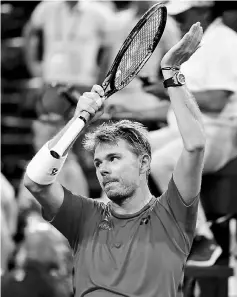  ??  ?? Stan Wawrinka celebrates his win over Yoshihito Nishioka of Japan during the BNP Paribas at Indian Wells Tennis Garden in Indian Wells, California in this March 15 file photo. — AFP photo