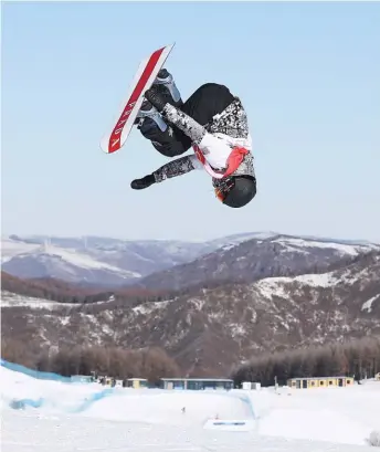  ?? GETTY IMAGES ?? American Julia Marino performs a trick during the women’s snowboard slopestyle final.