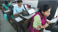  ?? INDRANIL MUKHERJEE / AGENCE FRANCE-PRESSE ?? Candidates use typewriter­s during the last official typing exam in Mumbai on Monday.