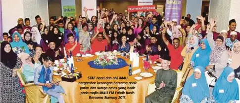  ??  ?? STAF hotel dan ahli iM4U bergambar kenangan bersama anak yatim dan warga emas yang hadir pada majlis iM4U FM Fabrik Kasih
Bersama Sunway 2017.