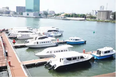  ??  ?? Motorised boats at Falomo, Ikoyi, Lagos