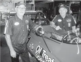  ?? TIM MILLER PHOTOGRAPH ?? Doug Crosty, left, and Bill Brack with their restored Formula Atlantic race car.