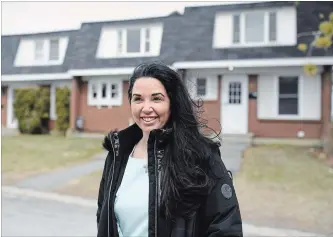  ?? JUSTIN TANG THE CANADIAN PRESS ?? Mortgage broker Kelly Wilson stands in a neighbourh­ood near her office in Ottawa. She says a majority of Canadians renew with their same lender, but it’s still important to check out your options.