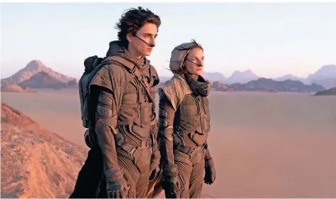  ?? ?? Die Schauspiel­er Timothée Chalamet (l.) und Rebecca Ferguson im Film „Dune“.