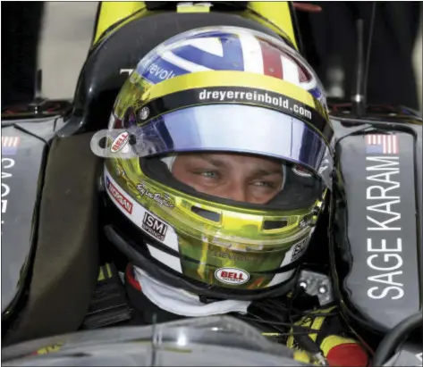  ?? THE ASSOCIATED PRESS ?? Sage Karam sits in the cockpit of his car during a practice session last Friday for this weekend’s Indianapol­is 500 IndyCar auto race.