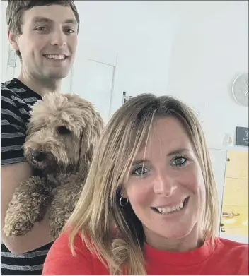  ??  ?? REUNITED
Fudge the cavapoo dog with owners Ben and Nadine Wright