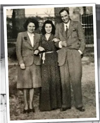 ??  ?? Gabriella with her parents after war ended. It was only her courageous interventi­on that led the Germans to spare her father Luigi and others