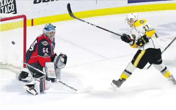  ?? NICK BRANCACCIO ?? Sarnia Sting’s Jake Josling bangs the puck off the crossbar against Spitfires goalie Michael DiPietro in Game 6 of their OHL playoff series at WFCU on Sunday.