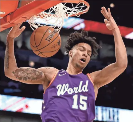  ?? NAM Y. HUH/AP ?? World forward Brandon Clarke of the Memphis Grizzlies dunks during the NBA Rising Stars basketball game in Chicago on Friday.