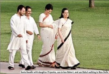  ??  ?? Sonia Gandhi with daughter Priyanka, son-in-law Robert, and son Rahul walking in New Delhi