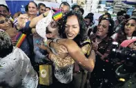  ?? PHOTO: REUTERS ?? Welcome news . . . Supporters of the LGBT community express their jubilation after the Indian Supreme Court’s verdict decriminal­ising gay sex, at an NGO in Mumbai.