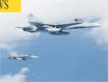  ?? CPL. PATRICK DROUIN / 4 WING COLD LAKE FILES ?? An official with Public Services and Procuremen­t Canada says a request for proposals for new fighter jets to replace the existing fleet of CF-18s is expected in spring 2019 and a contract would be signed in late 2021 or early 2022.