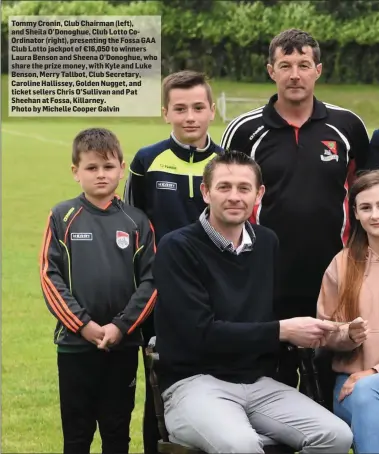  ?? Photo by Michelle Cooper Galvin ?? Tommy Cronin, Club Chairman (left), and Sheila O’Donoghue, Club Lotto CoOrdinato­r (right), presenting the Fossa GAA Club Lotto jackpot of €16,050 to winners Laura Benson and Sheena O’Donoghue, who share the prize money, with Kyle and Luke Benson, Merry...