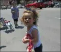  ??  ?? Stella enjoying the parade with her friend, Anthony.