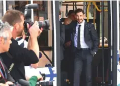  ??  ?? Photograph­ers take pictures as Australia football team’s player Mathew Leckie waits in a bus upon arrival at Kazan airport, as Australia’s national football team arrives in Kazan ahead of the Russia 2018 World Cup. — AFP photo