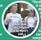  ??  ?? New beau Cody Simpson is by Miley’s
side