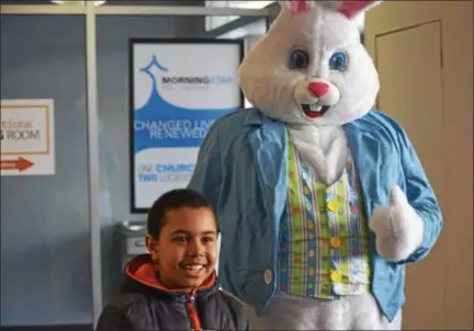  ?? MARIAN DENNIS — DIGITAL FIRST MEDIA ?? No Easter egg hunt would be complete without an appearance by the Easter Bunny. Kids could take pictures with the famous rabbit in between grabbing a bite to eat and enjoying the crafts and an egg hunt.