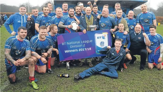  ?? Picture: Kim Cessford. ?? Kikrcaldy celebrate clinching the BT National League Division Two title after a nail-biting win over Hamilton.