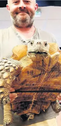  ??  ?? Jason Smith with Nancy Drew the tortoise