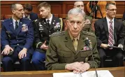  ?? CAROLYN KASTER / AP ?? Marine Gen. Thomas Waldhauser prepares to testify before the House Armed Services Committee on Capitol Hill on Tuesday about “National Security Challenges and U.S. Military Activities in Africa.”