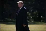  ?? AP PHOTO/ EVAN VUCCI ?? President Donald Trump walks to board Marine One for a trip to Walter Reed National Military Medical Center to attend his annual physical Friday in Washington.