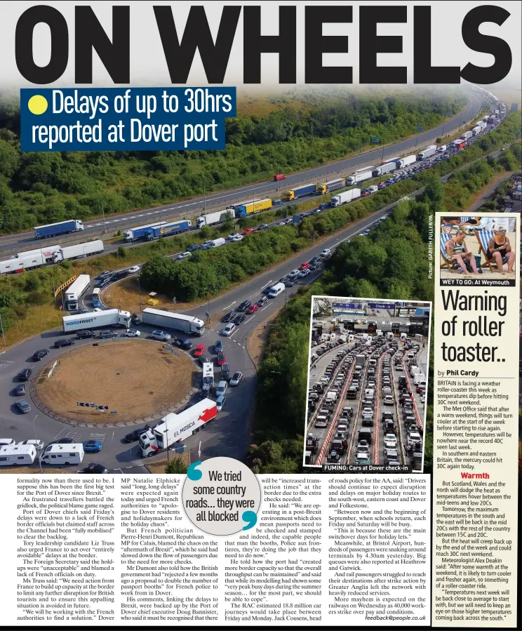  ?? ?? FUMING: Cars at Dover check-in